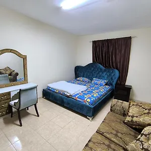 Opposite Mega Mall In Telephone Shops Roundabout Flat No 203 * Sharjah